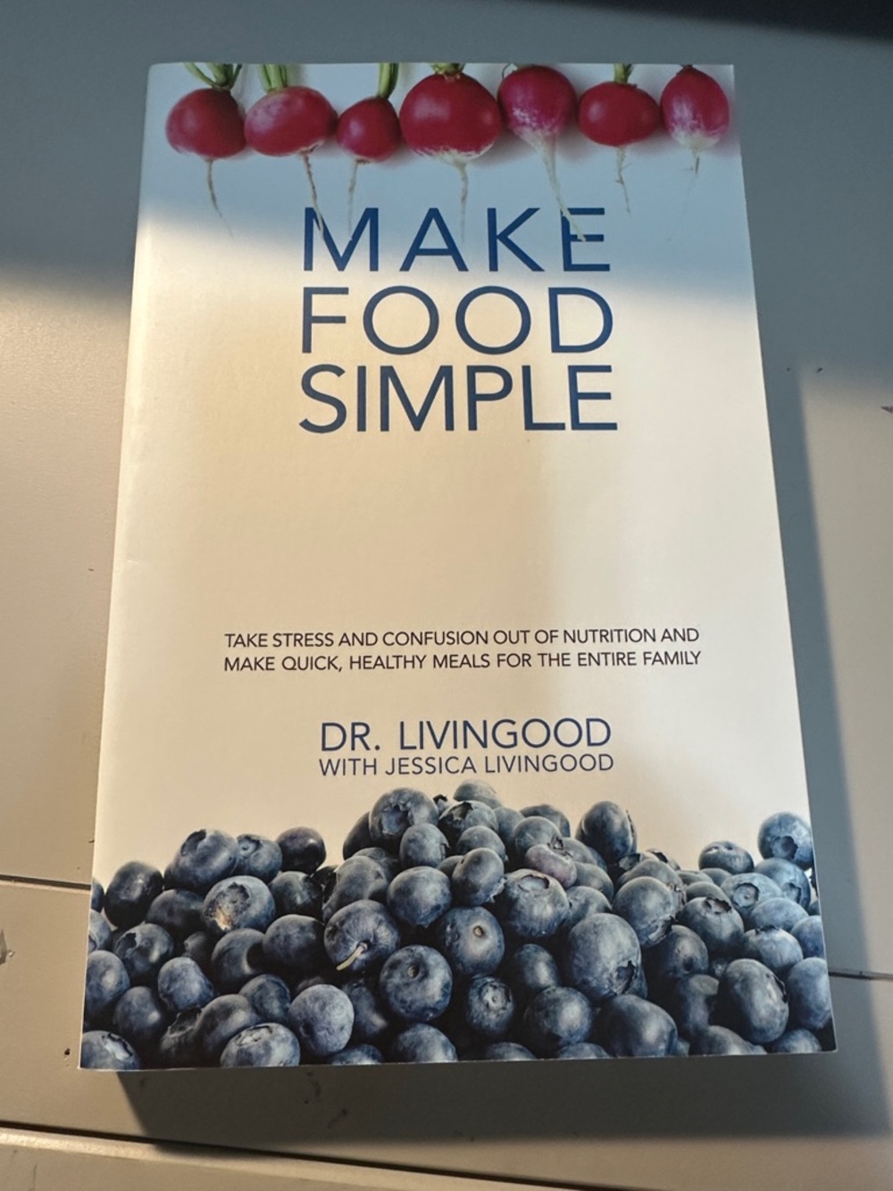 Make Food Simple by Dr. Livingood - White Cover with Blue & Red Fruit